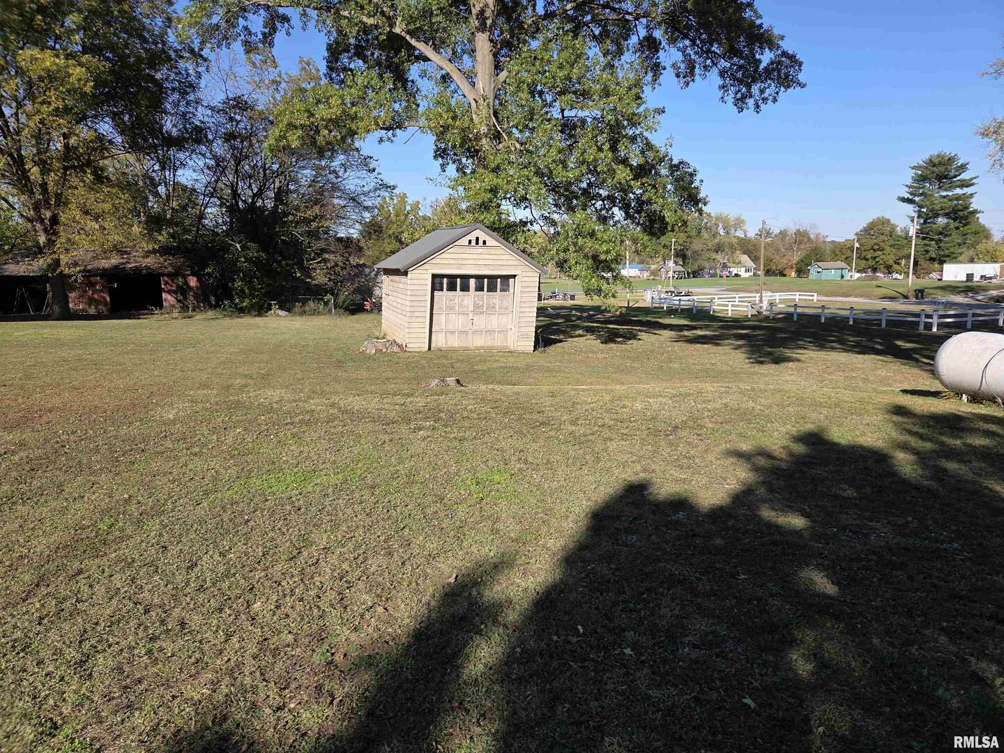 208 West Cherry Street Springerton, IL 62887 - Photo 3 of 13 a view of a town with large trees