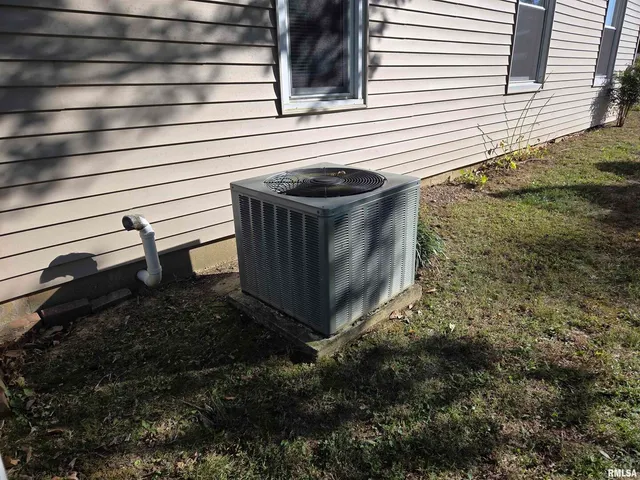a view of a backyard of the house