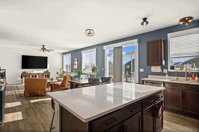 a view of a dining room with furniture window and outside view