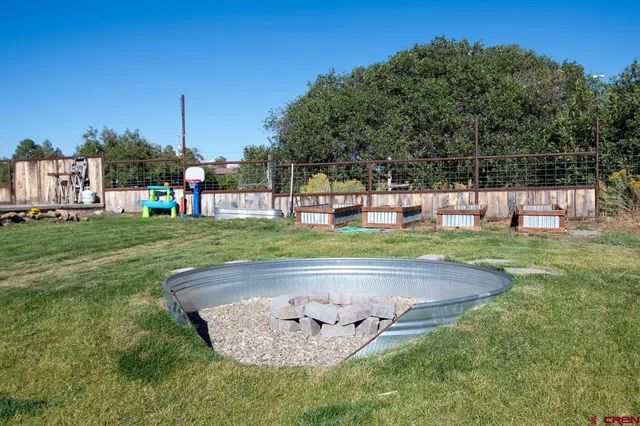 a view of a swimming pool with a sitting area