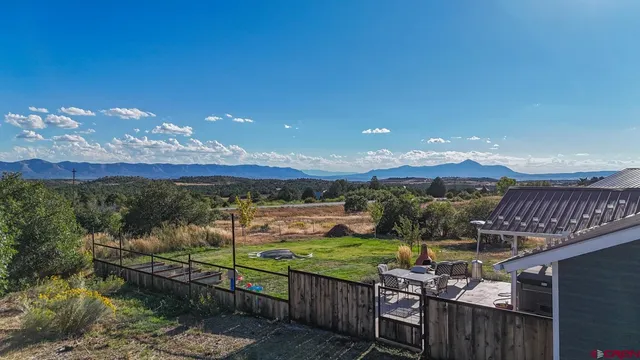 a view of a terrace with a garden