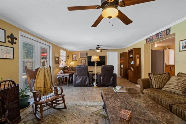 a view of a livingroom with furniture and a couch