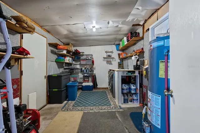 a view of a house with backyard patio and swimming pool