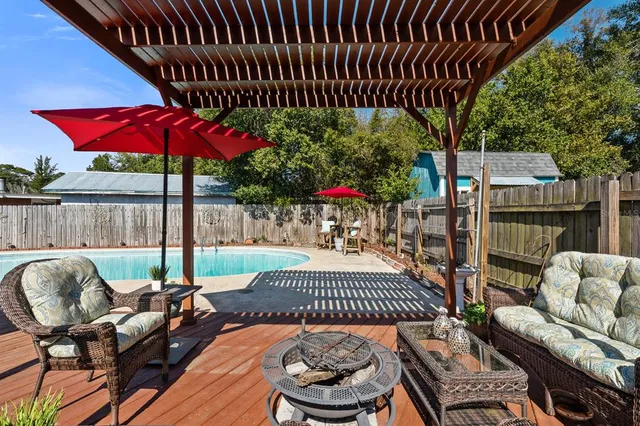 a view of outdoor space with signage and flags