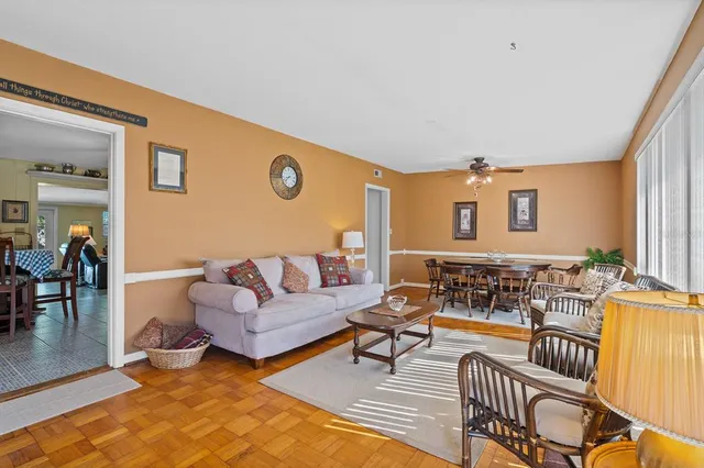 a living room with furniture and a window