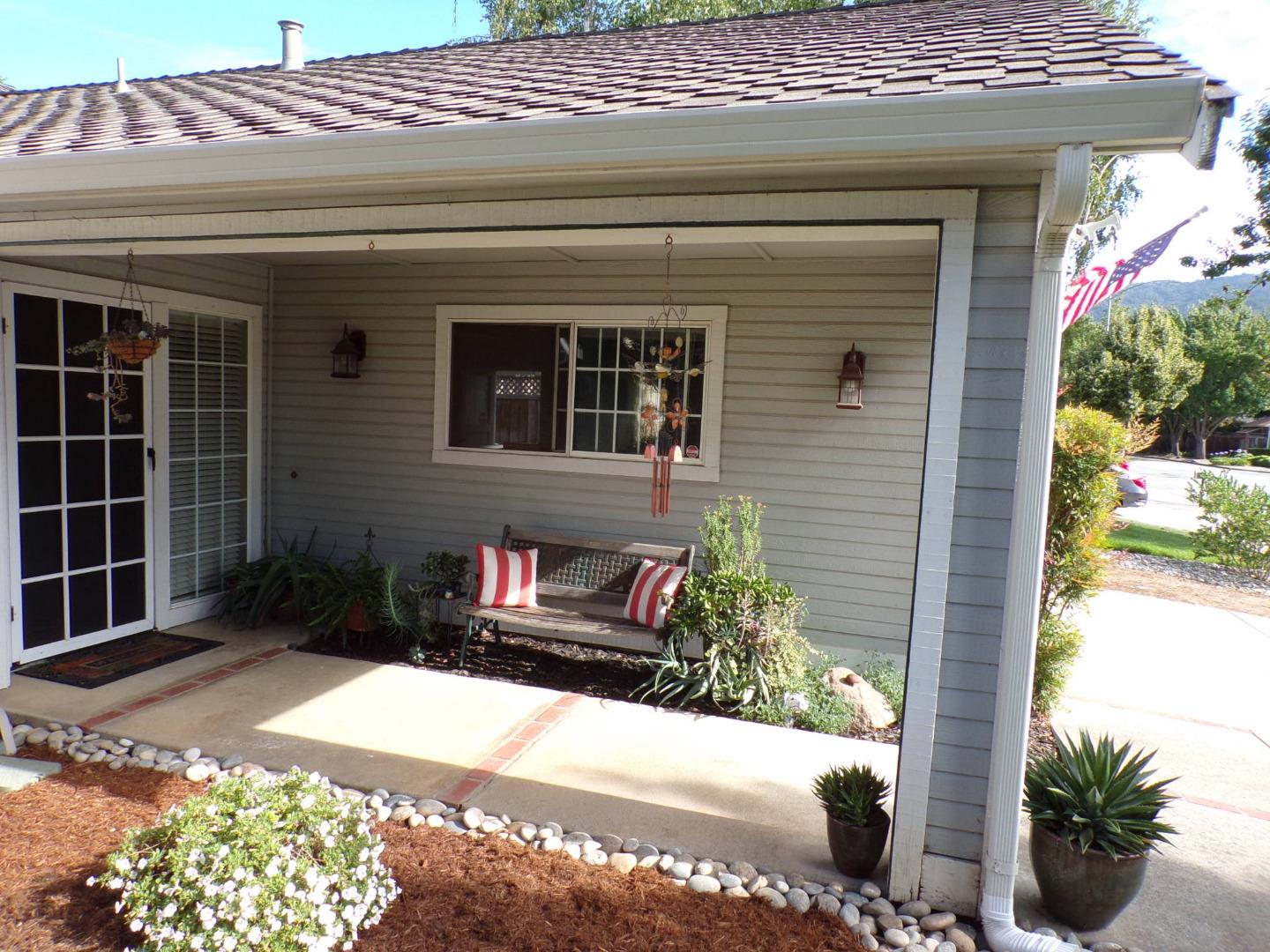 7674 Benassi Drive Gilroy, CA 95020 - Photo 2 of 16 a front view of a house with a yard