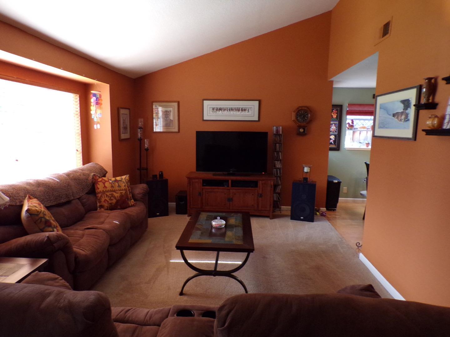 7674 Benassi Drive Gilroy, CA 95020 - Photo 7 of 16 a living room with furniture and a flat screen tv
