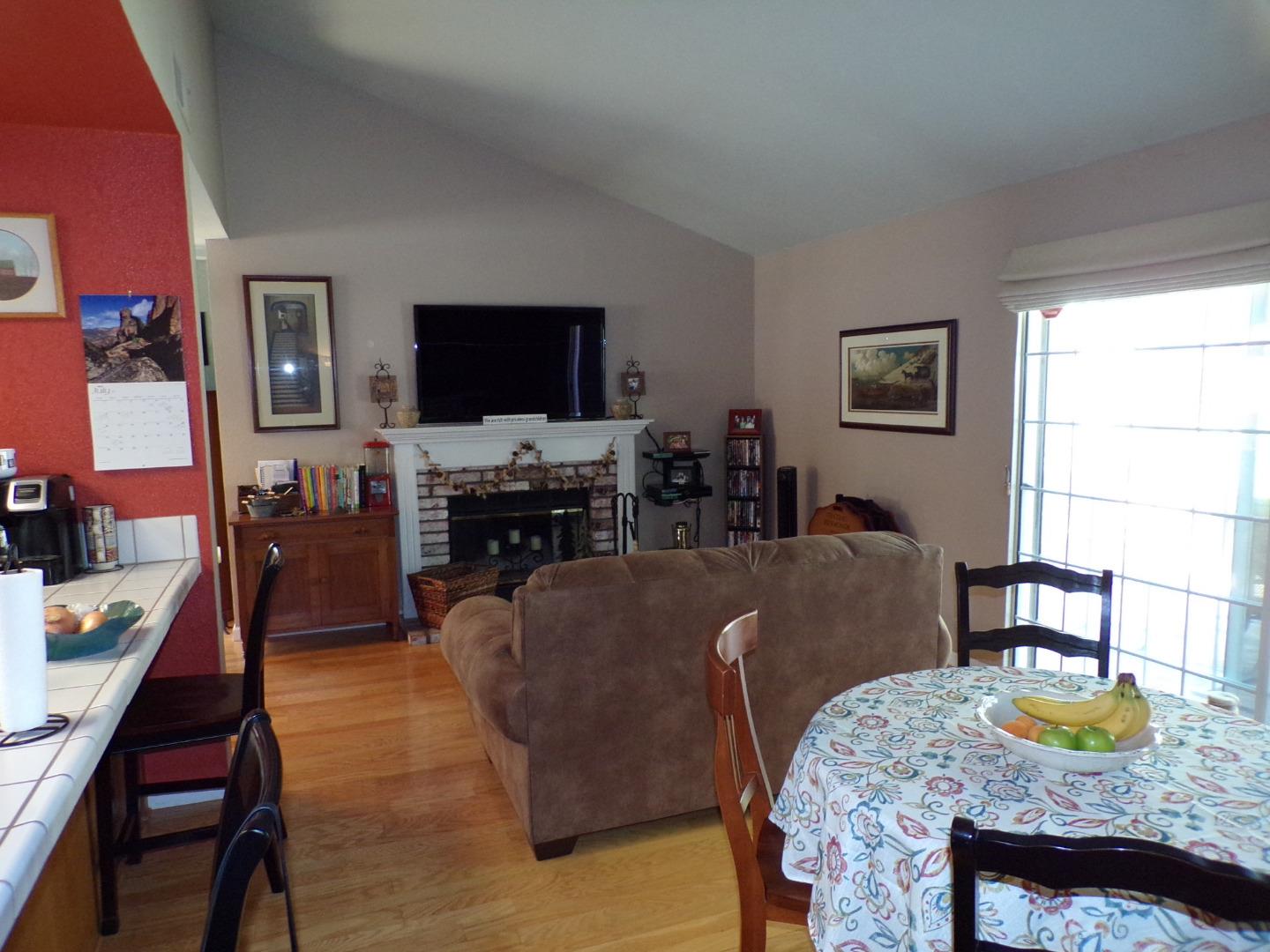 7674 Benassi Drive Gilroy, CA 95020 - Photo 8 of 16 a living room with furniture and a flat screen tv