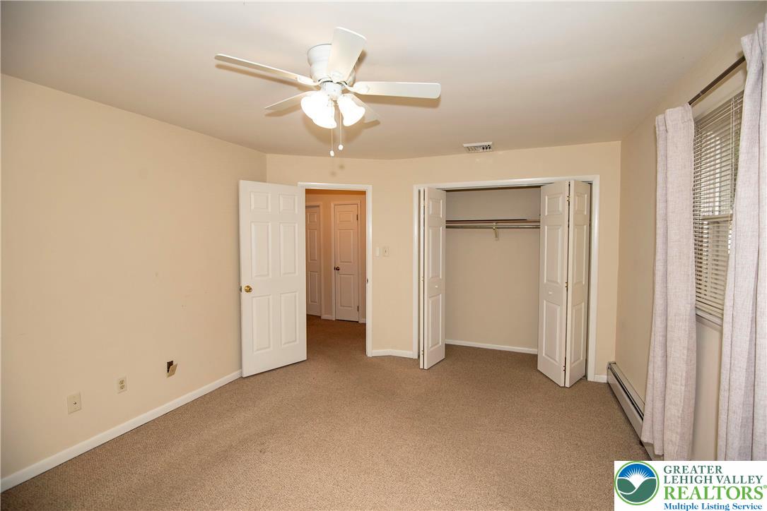 844 Weil Street Bethlehem, PA 18015 - Photo 11 of 19 an empty room with a ceiling fan and a window