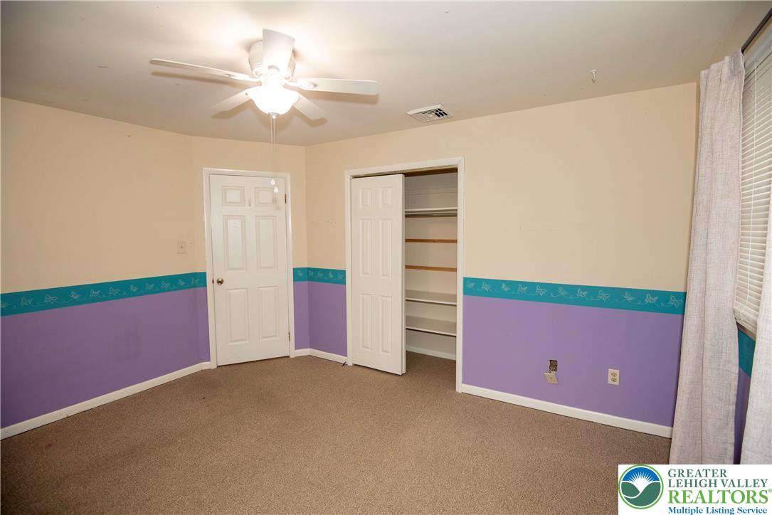 844 Weil Street Bethlehem, PA 18015 - Photo 12 of 19 a room with windows and ceiling fan