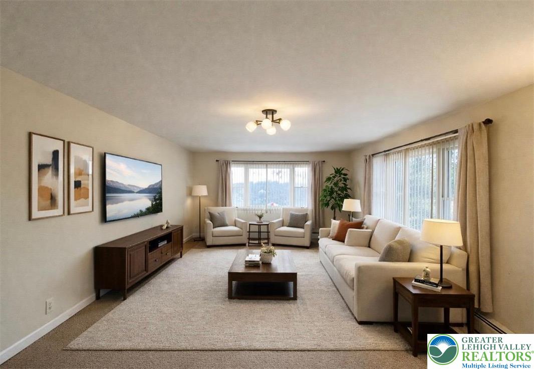 844 Weil Street Bethlehem, PA 18015 - Photo 5 of 19 a living room with furniture and a flat screen tv