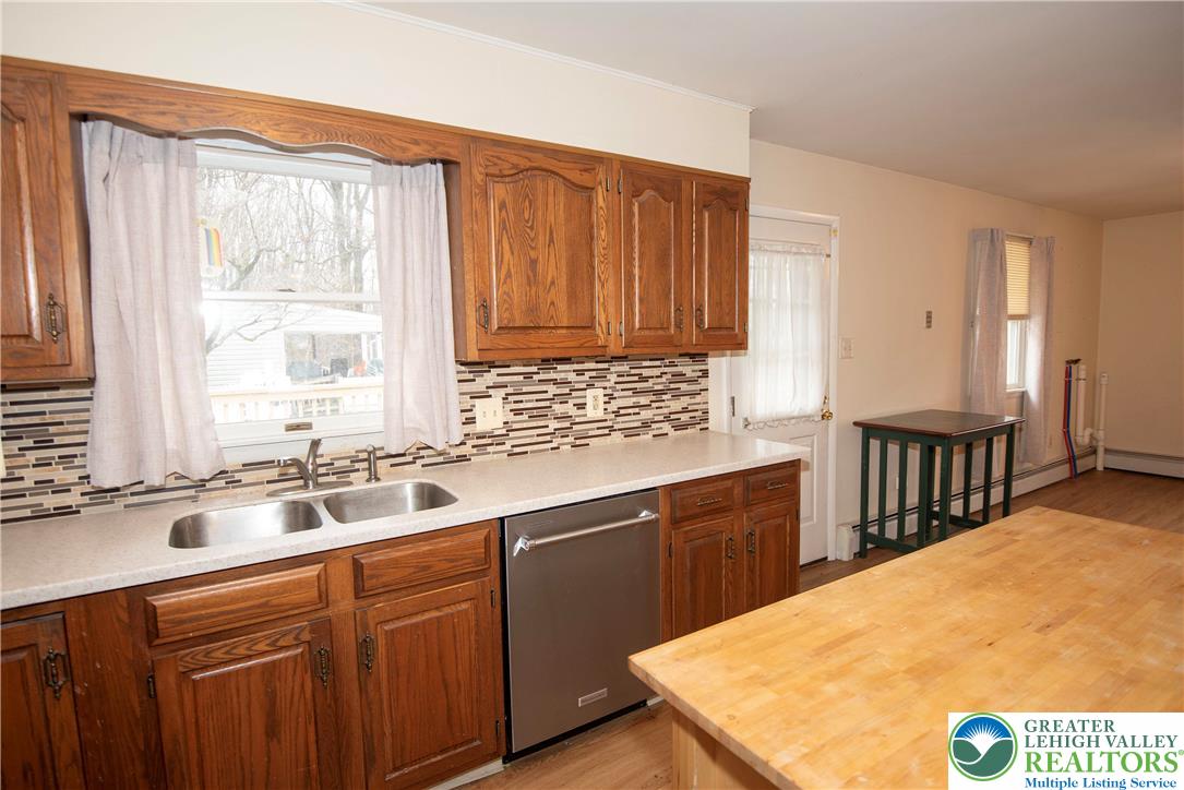 844 Weil Street Bethlehem, PA 18015 - Photo 7 of 19 a kitchen with a sink and cabinets