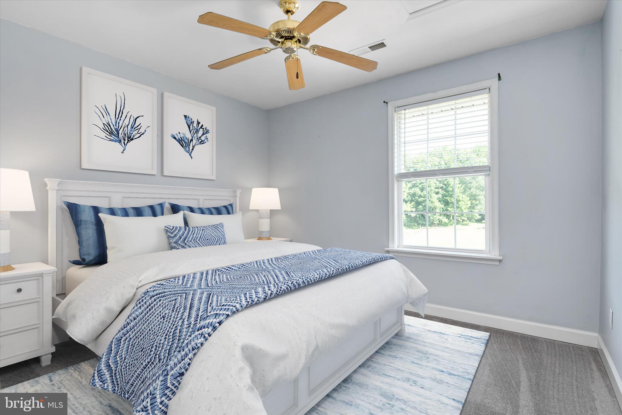 913 Clark Corner Road Centreville, MD 21617 - Photo 34 of 66 a bedroom with bed and wall painting with wooden floor