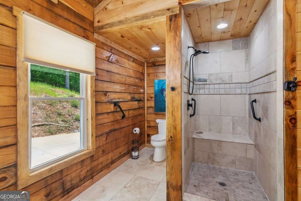 245 Timberwalk Drive, Unit 16 Ellijay, GA 30540 - Photo 27 of 56 a bathroom with a shower