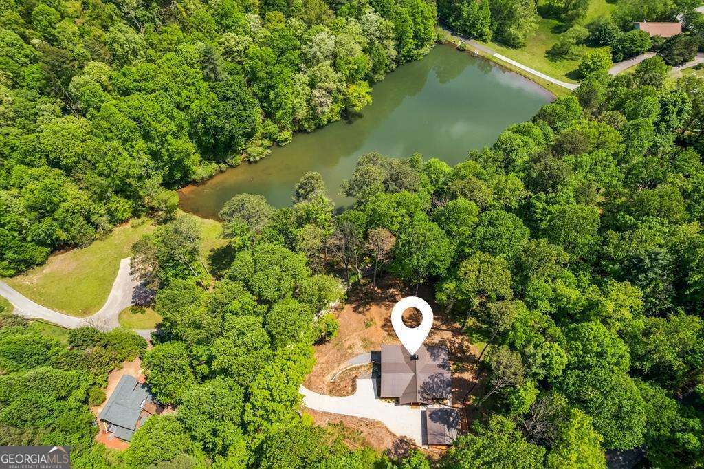 245 Timberwalk Drive, Unit 16 Ellijay, GA 30540 - Photo 3 of 56 a bird view of a house with a yard and lake view