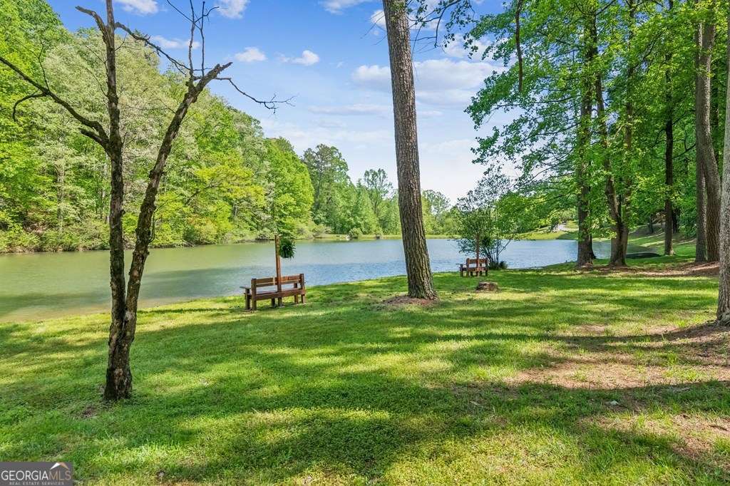 245 Timberwalk Drive, Unit 16 Ellijay, GA 30540 - Photo 46 of 56 a view of a park with large trees