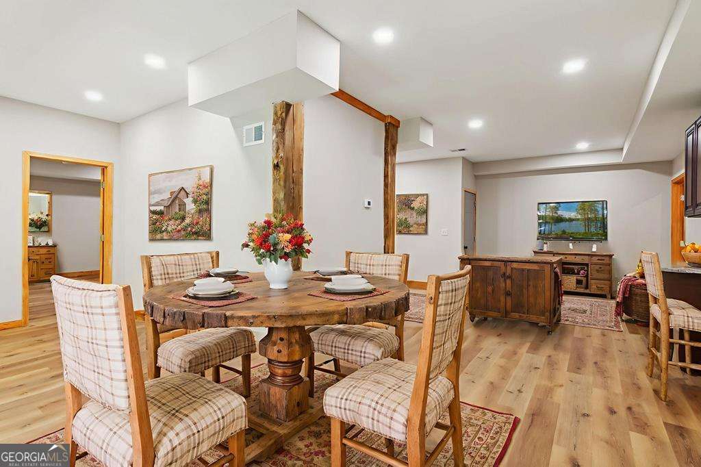 245 Timberwalk Drive, Unit 16 Ellijay, GA 30540 - Photo 53 of 56 a view of a dining room with furniture