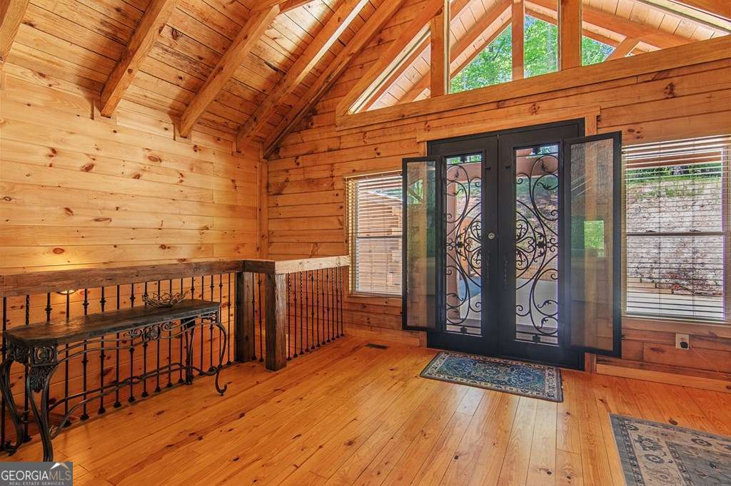245 Timberwalk Drive, Unit 16 Ellijay, GA 30540 - Photo 8 of 56 a view of balcony with wooden floor and outdoor seating