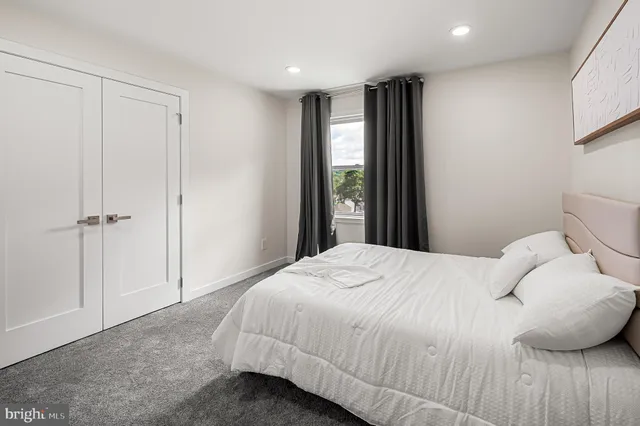 a view of a bathroom from a hallway