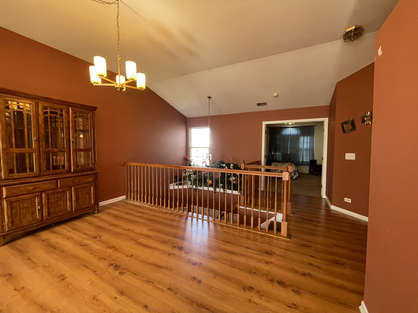 2043 Peach Tree Lane Algonquin, IL 60102 - Photo 5 of 19 a view of a livingroom with furniture a dinning room and stairs