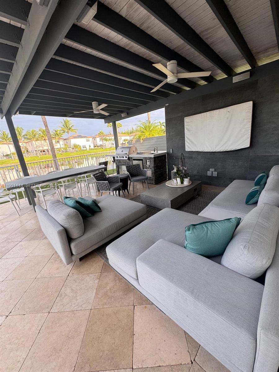 8850 Northwest 98th Court Doral, FL 33178 - Photo 7 of 26 a living room with furniture and a large window