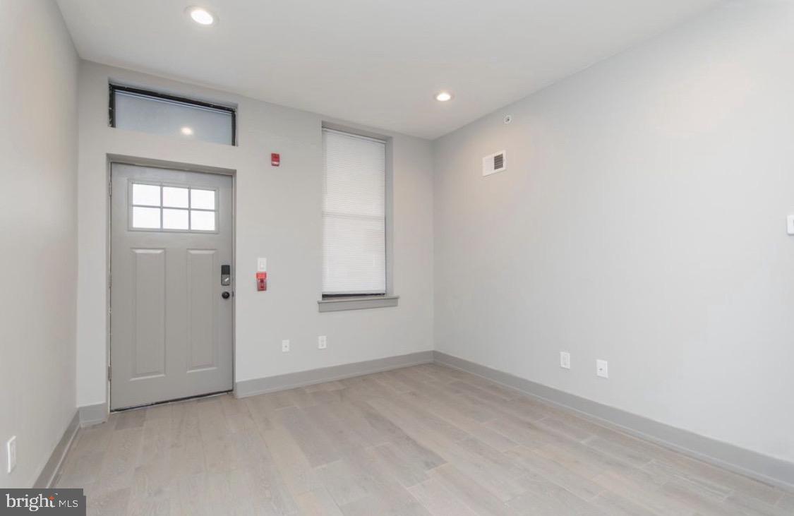 3339 Ridge Avenue Philadelphia, PA 19132 - Photo 12 of 33 an empty room with windows and closet