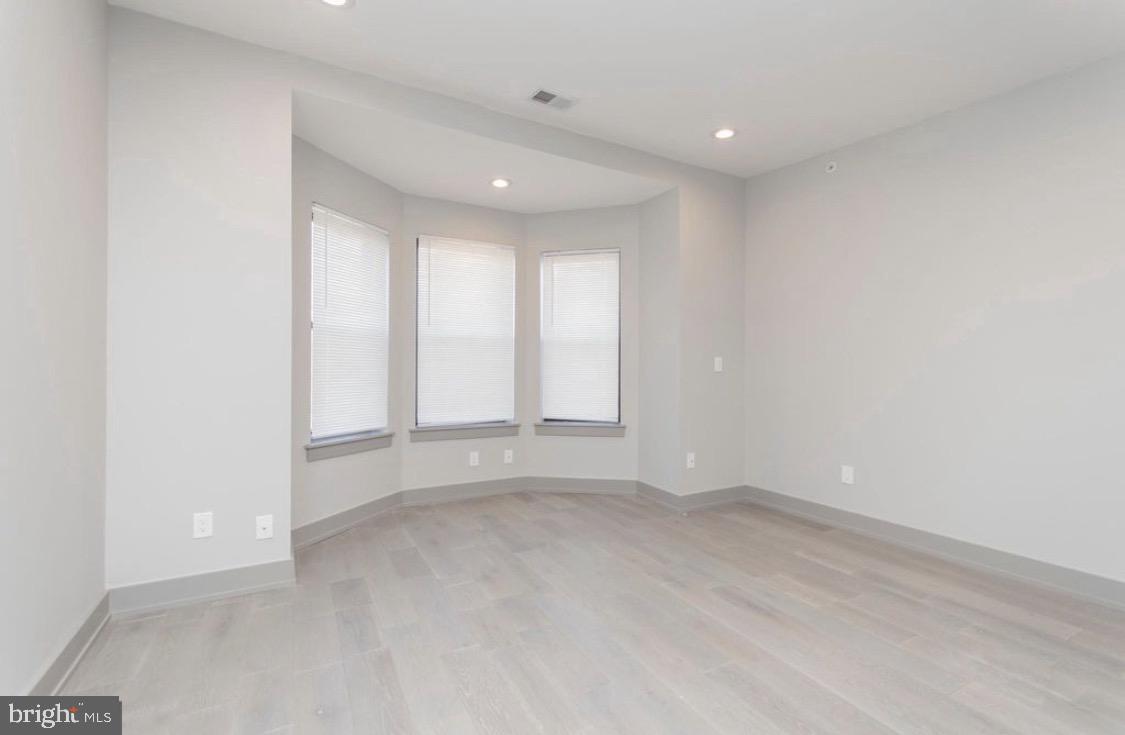 3339 Ridge Avenue Philadelphia, PA 19132 - Photo 24 of 33 an empty room with windows and closet