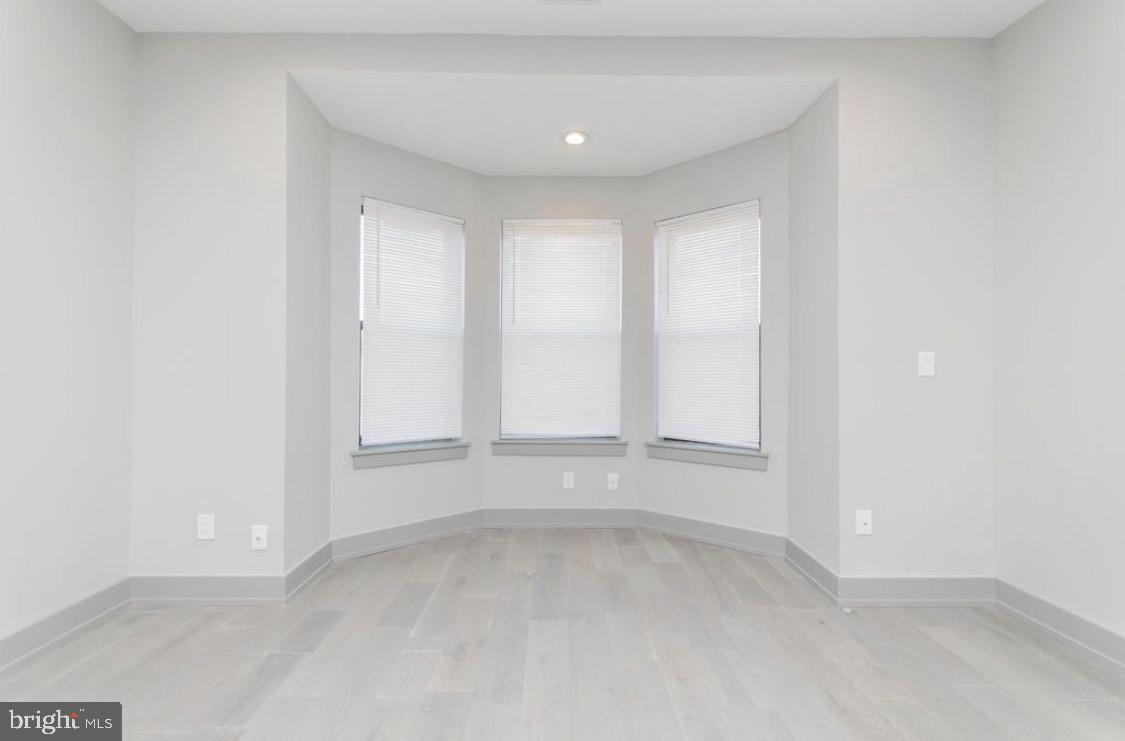 3339 Ridge Avenue Philadelphia, PA 19132 - Photo 25 of 33 an empty room with a empty space and windows