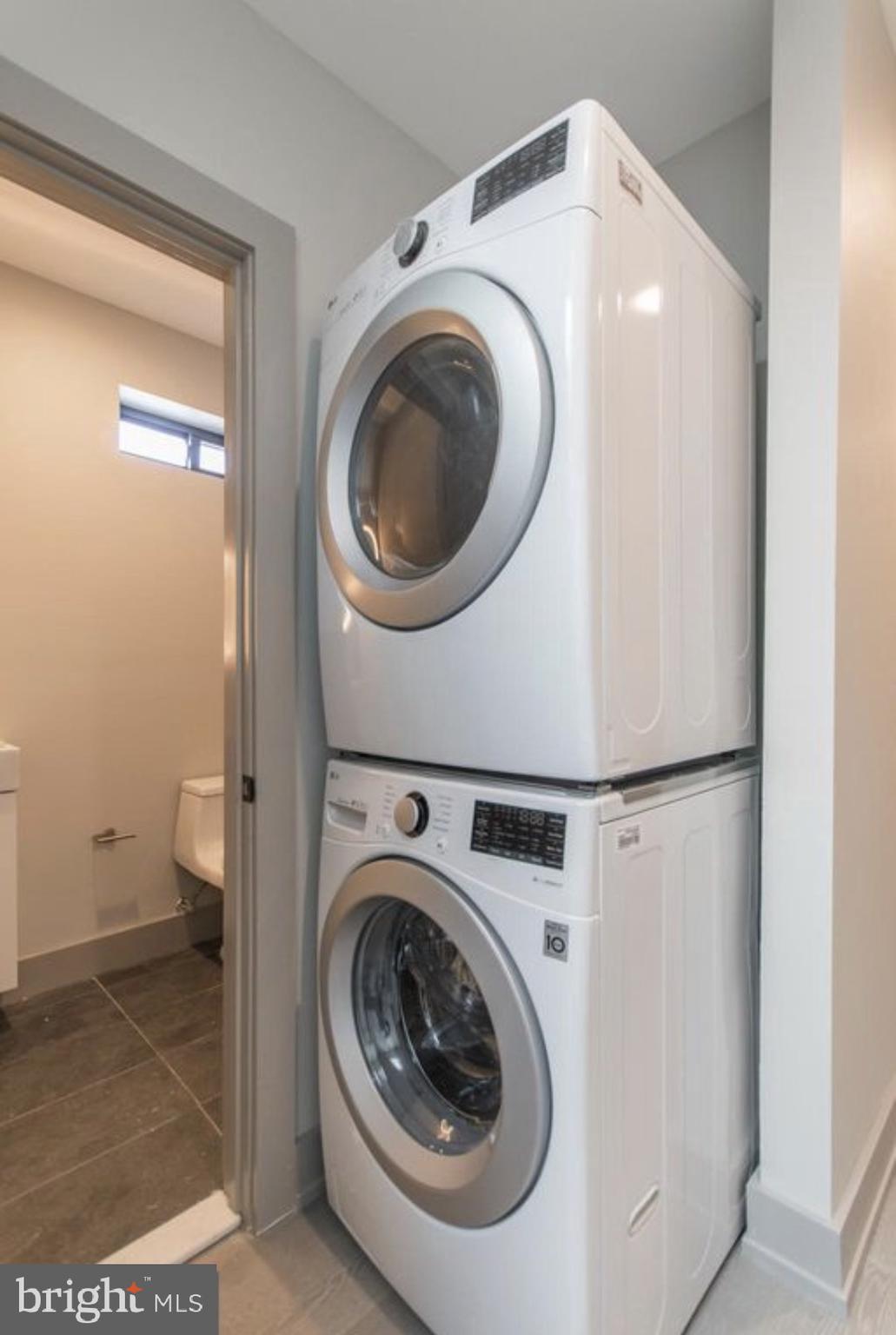 3339 Ridge Avenue Philadelphia, PA 19132 - Photo 26 of 33 a utility room with dryer and washer