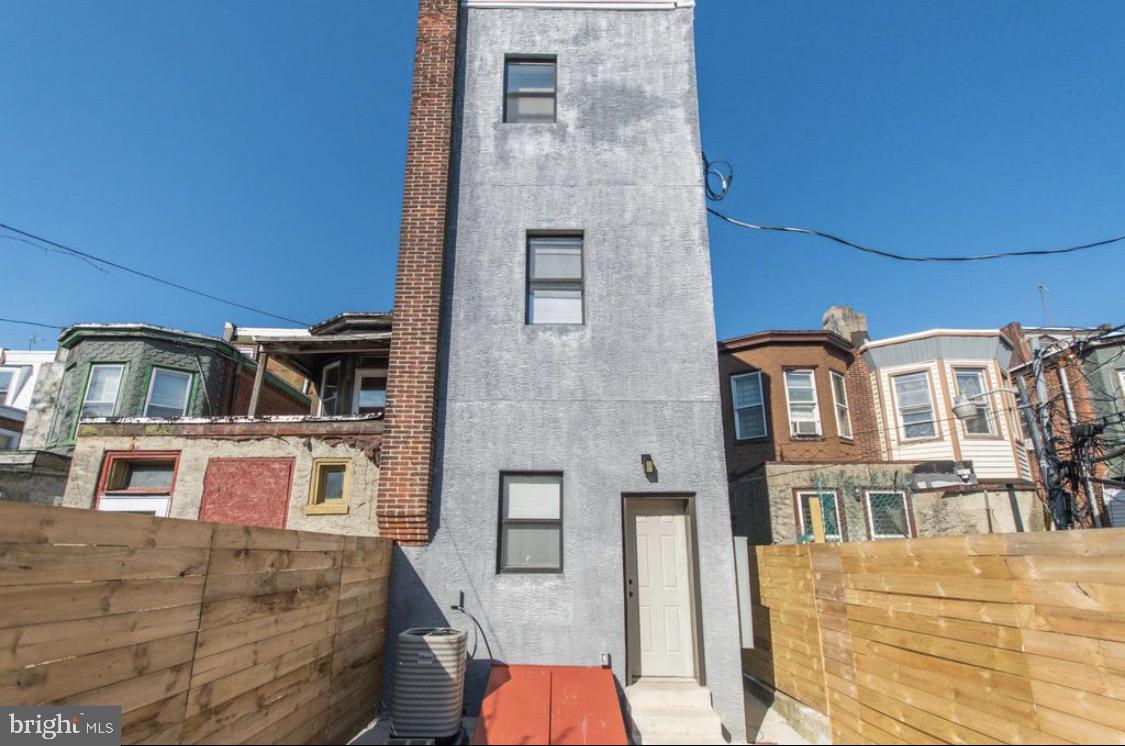 3339 Ridge Avenue Philadelphia, PA 19132 - Photo 31 of 33 a front view of a house with large windows
