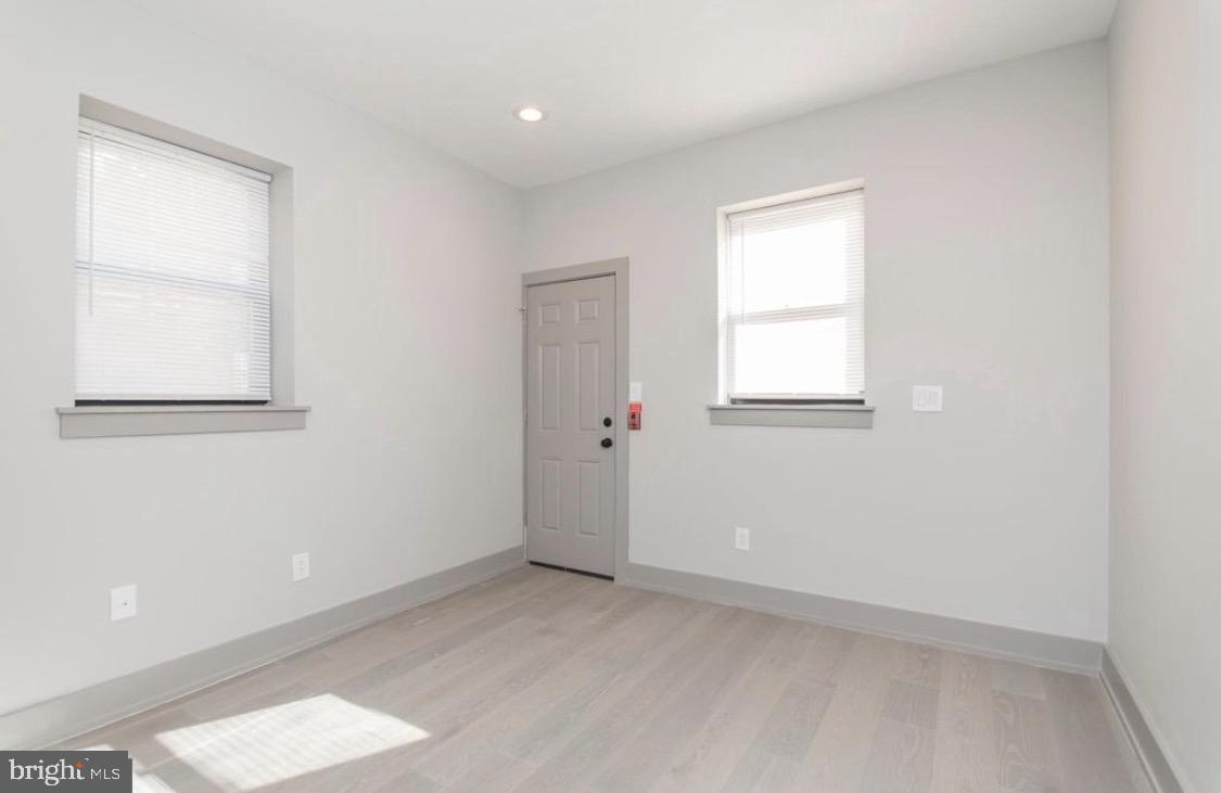 3339 Ridge Avenue Philadelphia, PA 19132 - Photo 7 of 33 an empty room with windows