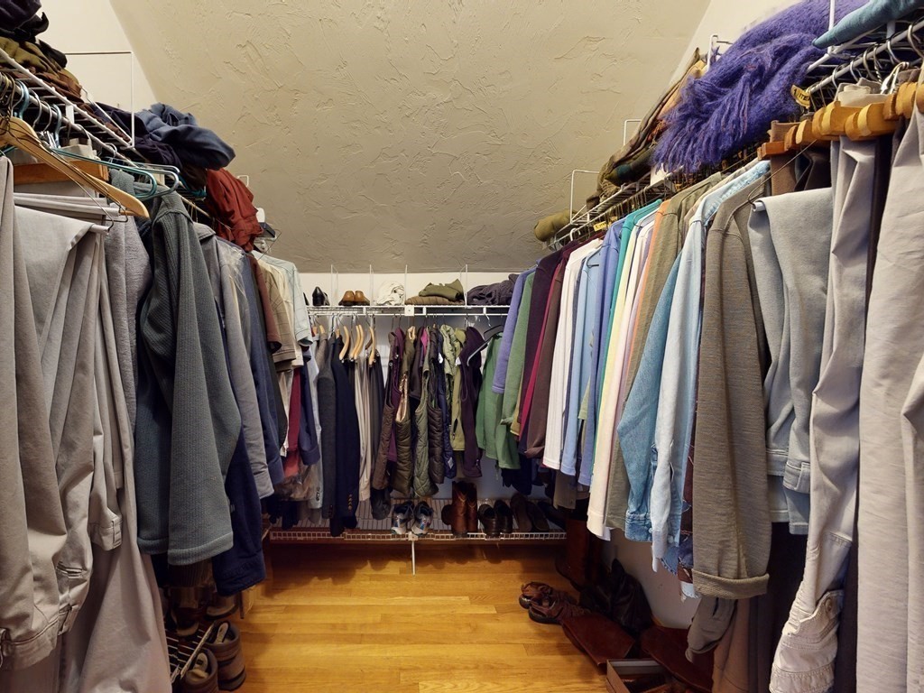 19 Lambert Road Belmont, MA 02478 - Photo 30 of 42 a view of walk in closet with clothes