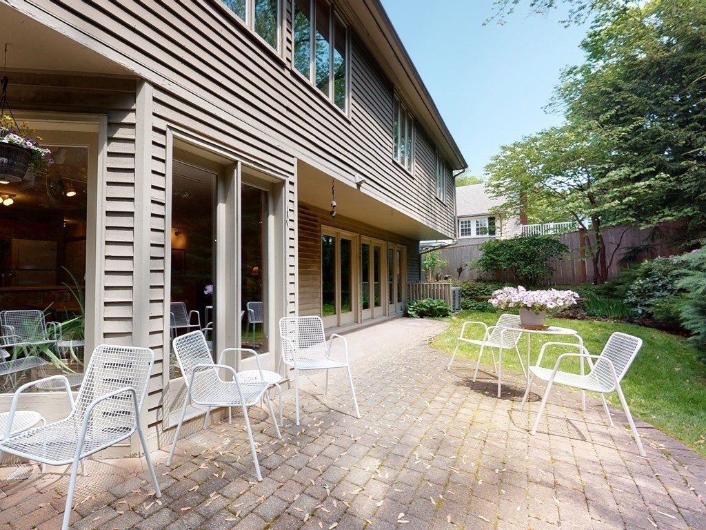 19 Lambert Road Belmont, MA 02478 - Photo 37 of 42 a view of a chair and tables in the patio