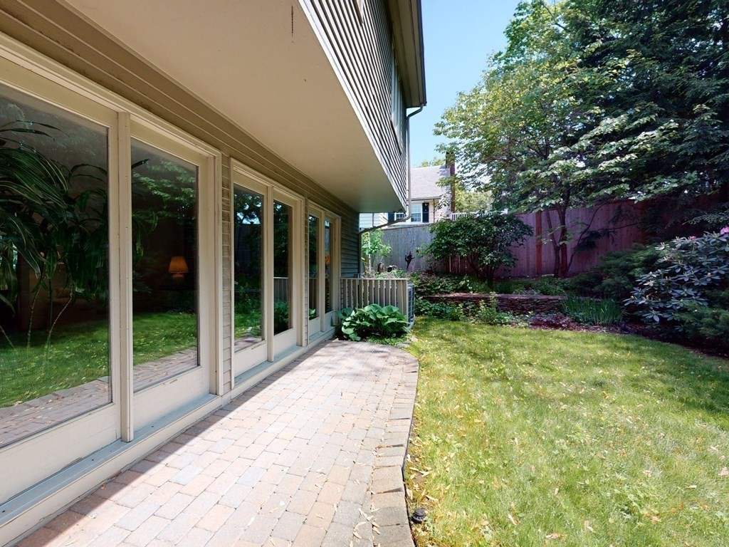 19 Lambert Road Belmont, MA 02478 - Photo 38 of 42 a view of backyard with plants and outdoor seating