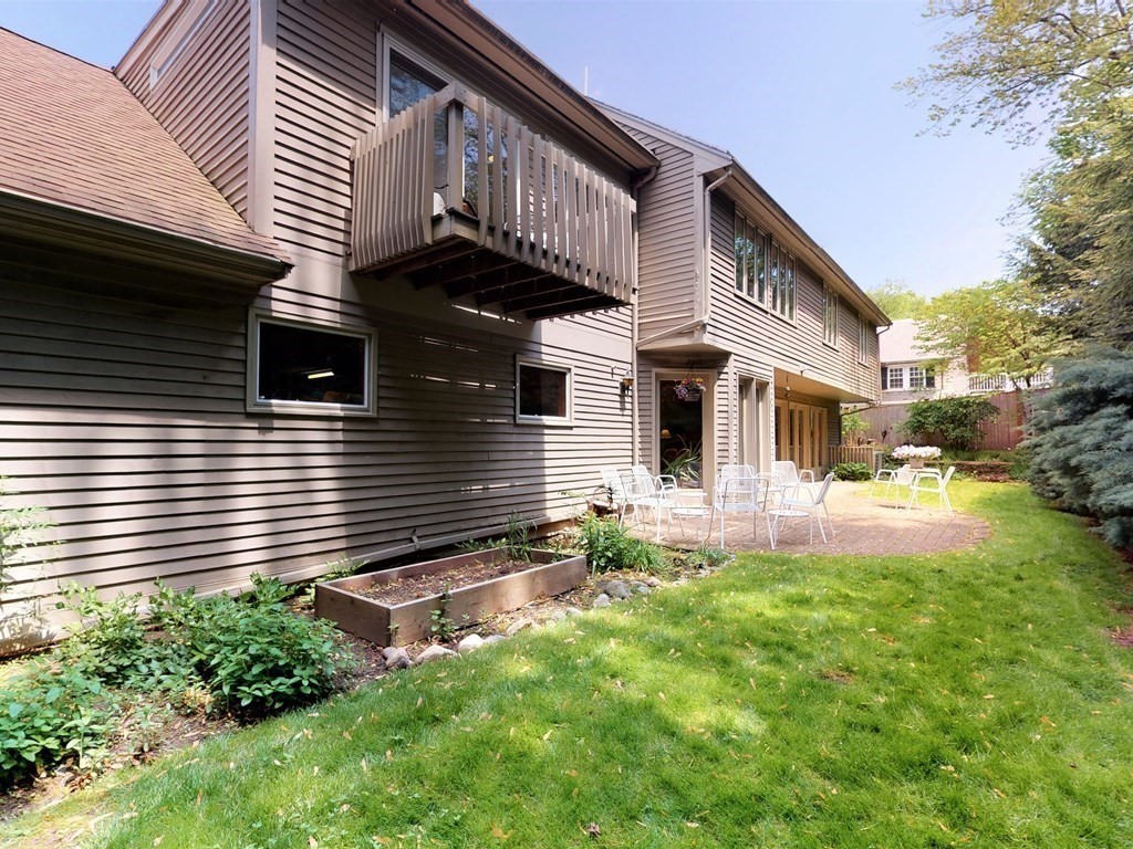 19 Lambert Road Belmont, MA 02478 - Photo 39 of 42 a front view of a house with a yard