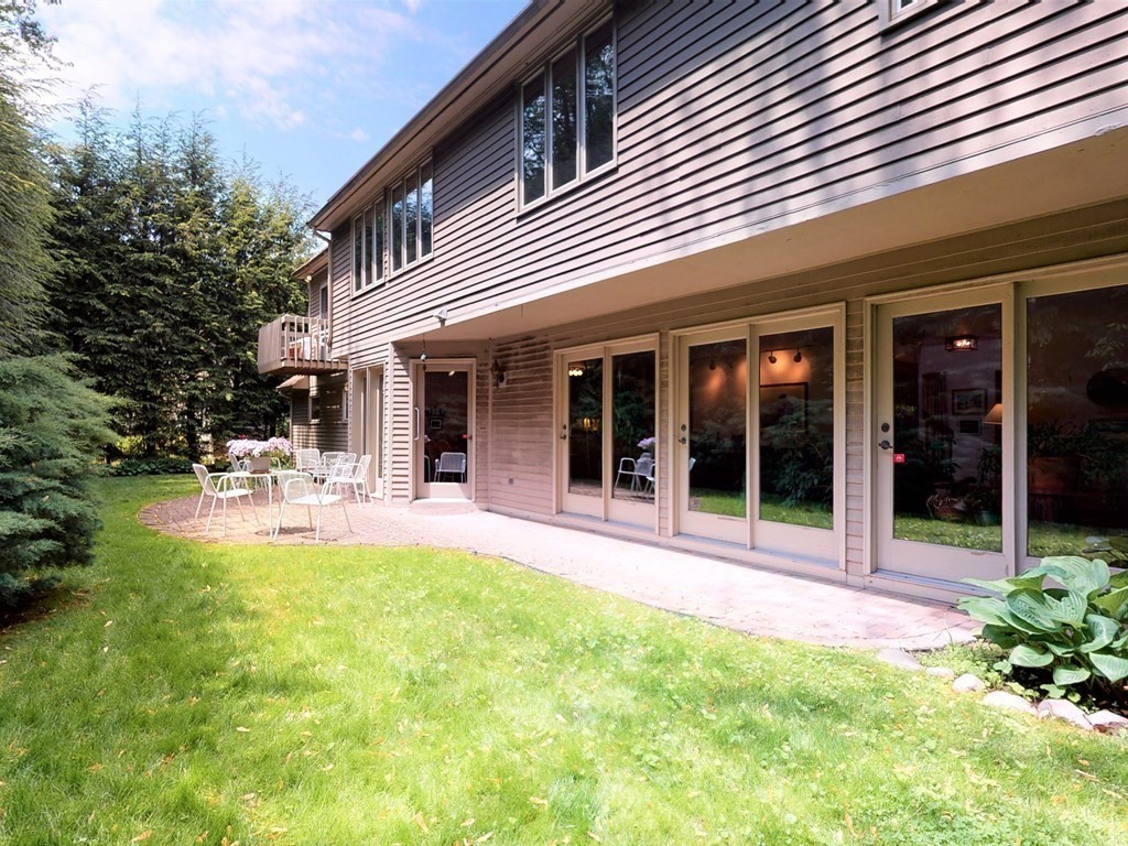 19 Lambert Road Belmont, MA 02478 - Photo 40 of 42 a view of a house with sitting area and garden