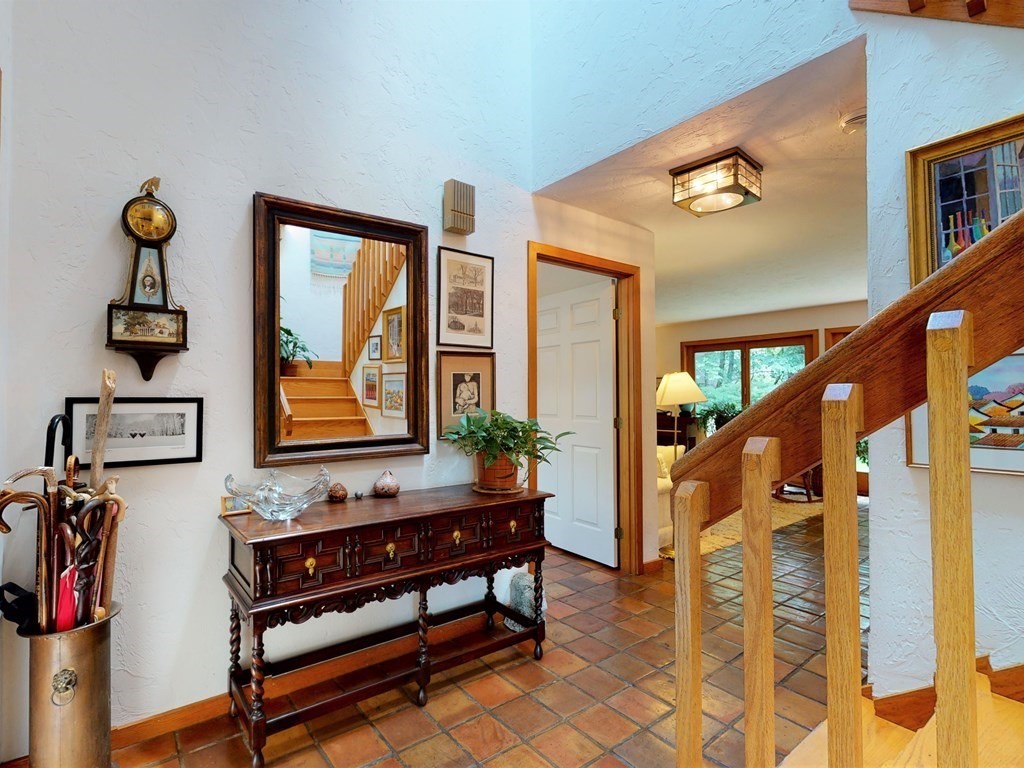 19 Lambert Road Belmont, MA 02478 - Photo 6 of 42 a view of a livingroom with furniture and entryway