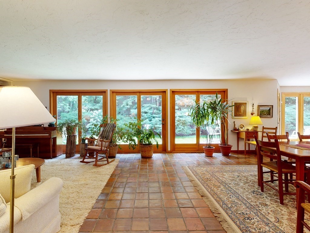19 Lambert Road Belmont, MA 02478 - Photo 8 of 42 a living room with furniture and a large window