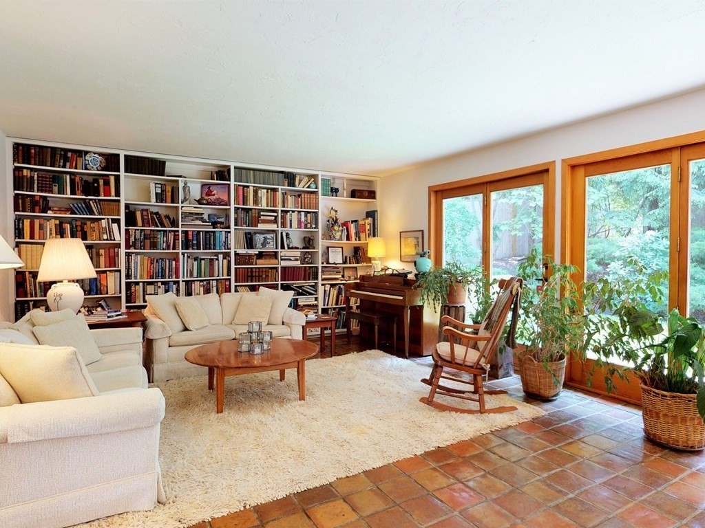 19 Lambert Road Belmont, MA 02478 - Photo 10 of 42 a view of a livingroom with lounge chair and a large window