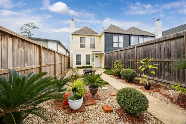 a garden view with a seating space