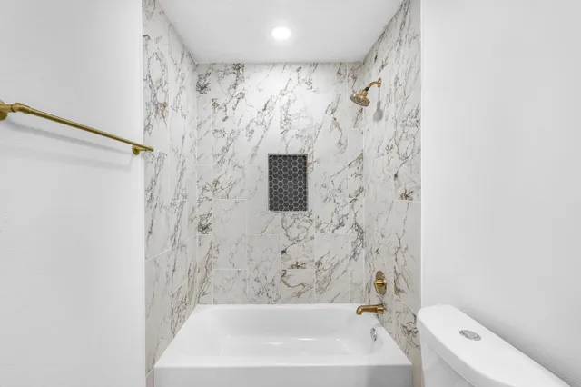 a bathroom with a shower curtain