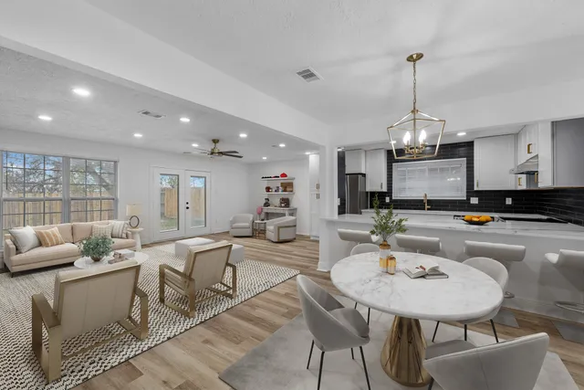 a view of a dining room with furniture