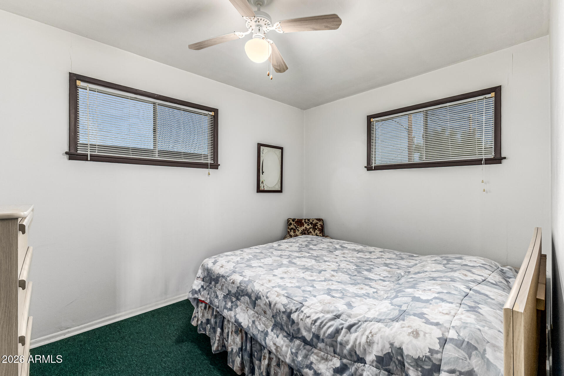700 North Victory Drive Apache Junction, AZ 85120 - Photo 15 of 28 a bedroom with a bed and a window