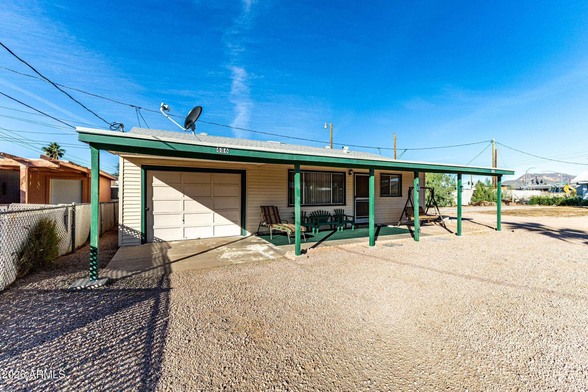 700 North Victory Drive Apache Junction, AZ 85120 - Photo 20 of 28 a view of house with outdoor space