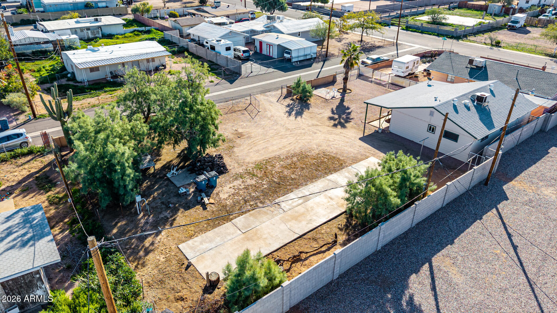 700 North Victory Drive Apache Junction, AZ 85120 - Photo 25 of 28 an aerial view of a house with a yard and lake view