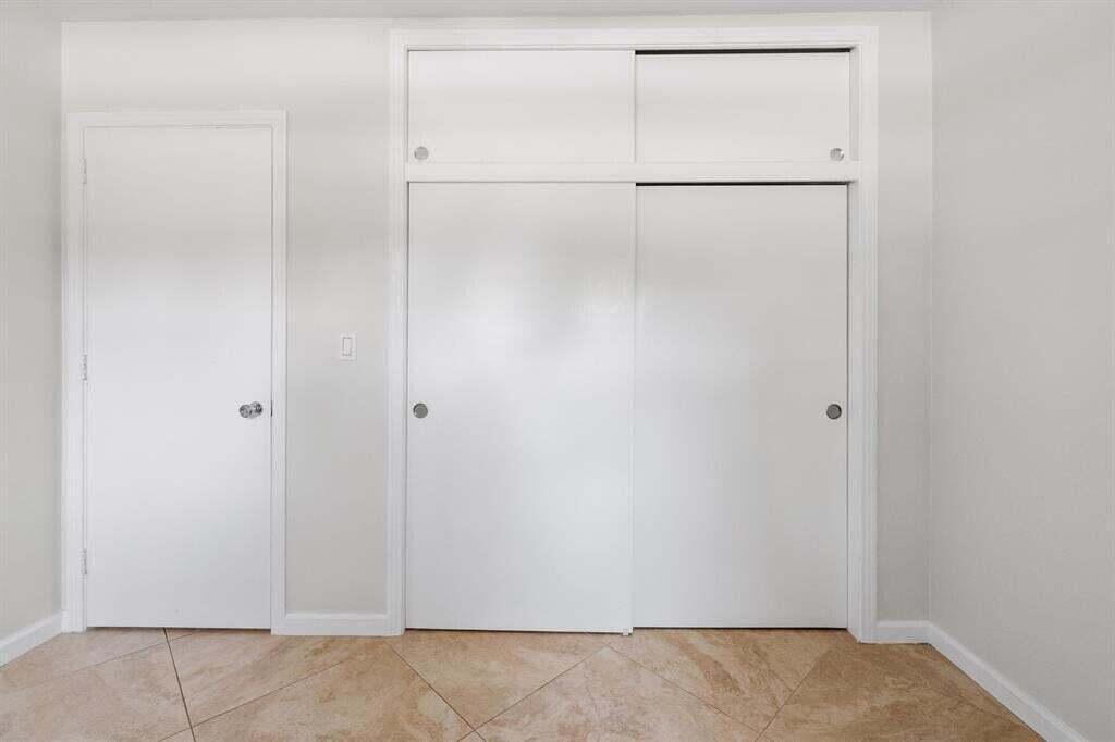 3801 Northeast 22nd Terrace, Unit 2 Lighthouse Point, FL 33064 - Photo 10 of 19 a view of an empty room