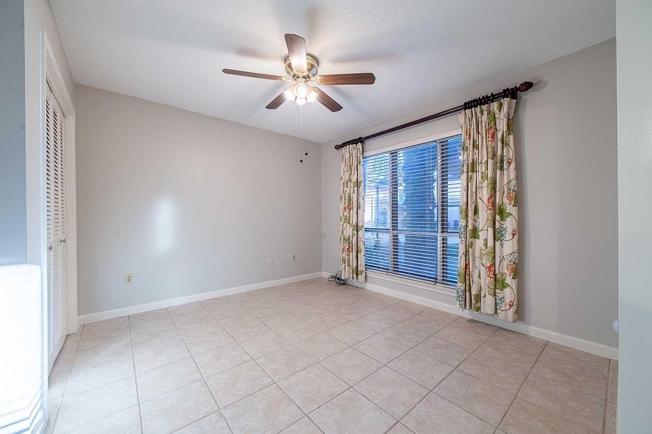 409 South Perkins Road, Unit 3 Memphis, TN 38117 - Photo 5 of 23 Den with nice size closet you could put your tv in, if you wanted to or set up a desk in it.