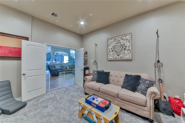 a living room with furniture and a couch