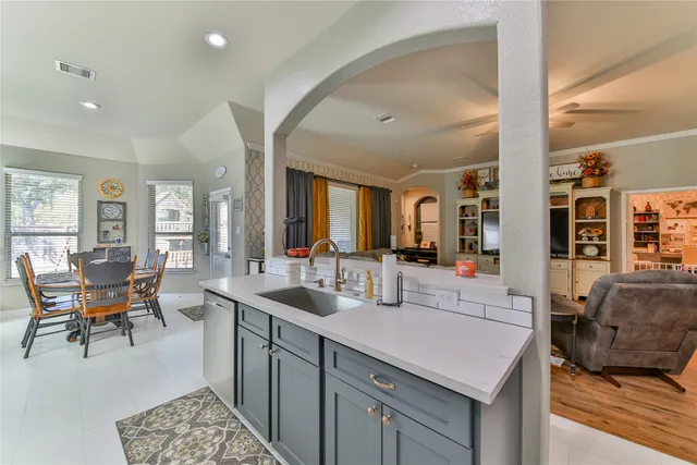 a view of a kitchen with granite countertop lots of counter top space