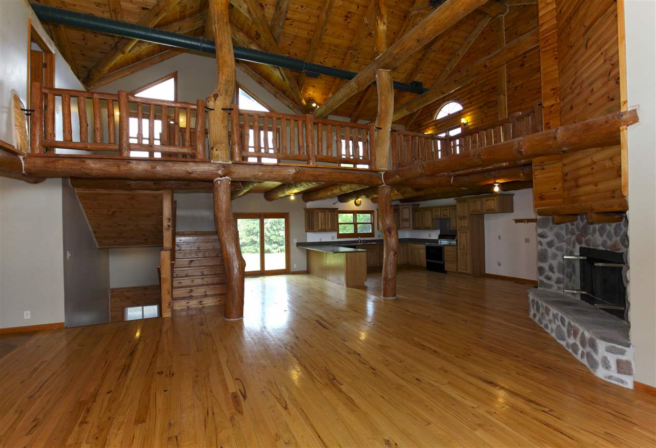20100 Grade School Road Caledonia, IL 61011 - Photo 3 of 21 a view of a hall with wooden floor